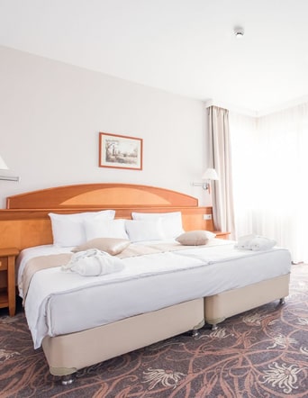 Standardní pokoje s manželskou postelí nebo se samostatnými lůžky